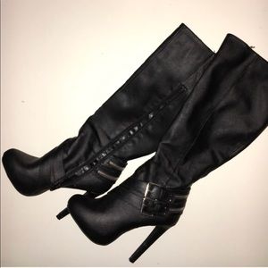 Black boots with 5” heels